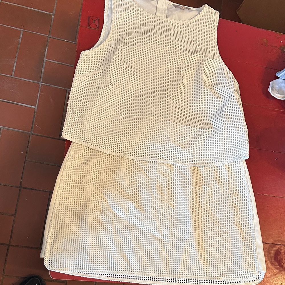 Banana Republic Cream Sleeveless outfit size 12 top and skirt, has some damage!